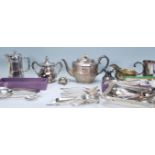 A collection of silver plated wares to include coffee pots, teapots. sugar bowl, creamer, jugs,