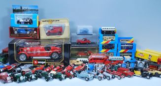 A collection of mixed diecast model cars of various makes and makers to include Burago model of a