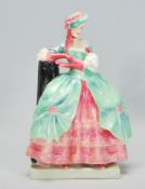 A vintage early Royal Doulton figure Kate Hardcastle. Ref No. 803645 HN1719. Measures 21cm tall by