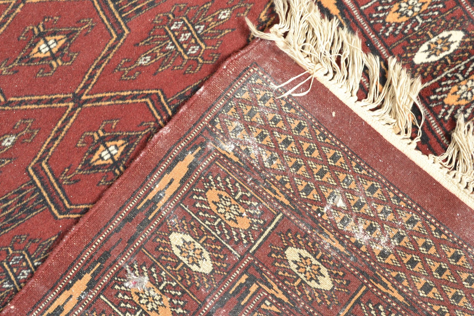 A collection of  20th century rugs to include a large red ground Persian runner with geometric - Image 7 of 7