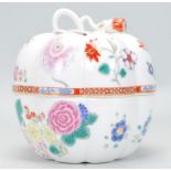 A Chinese export porcelain pumpkin lidded vase decorated in famille rose decoration with embellished