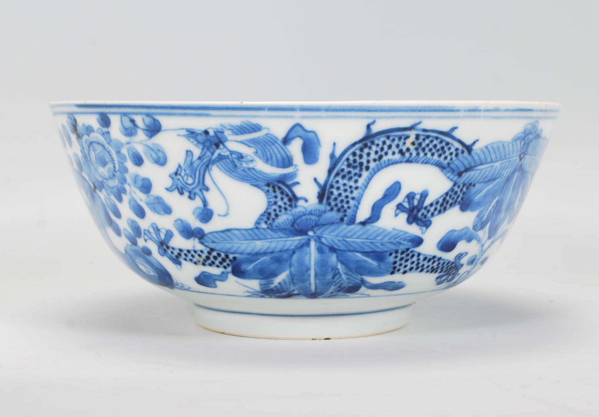 A 19th Century Chinese centrepiece bowl hand painted blue and white decoration having hand painted
