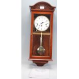 A good solid mahogany cased  Comitti of London strike and chime wall clock. The roman numeral