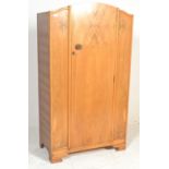 An early 20th Century walnut  bachelors single wardrobe compactum, single door to front opening to