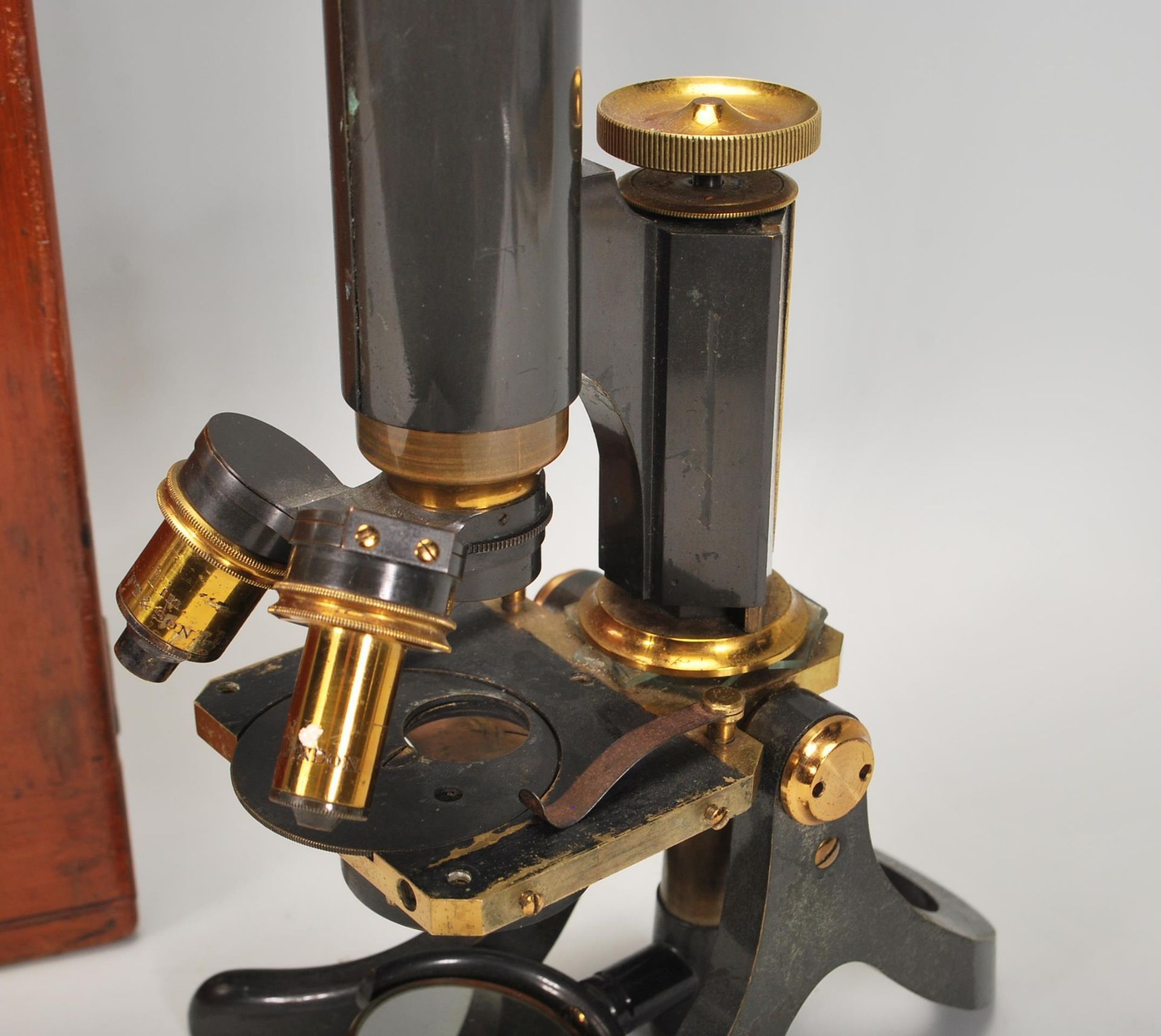 A late 19th early 20th Century J. Swift and Son, black japanned and lacquered brass microscope and - Image 3 of 8