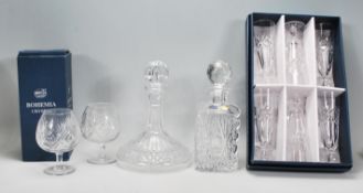 A selection 20th Century cut glass to include a Waterford Crystal cut glass ships decanter