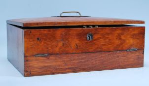 A Victorian oak travelling  / clerks writing slope box having hinged top with handle opening to