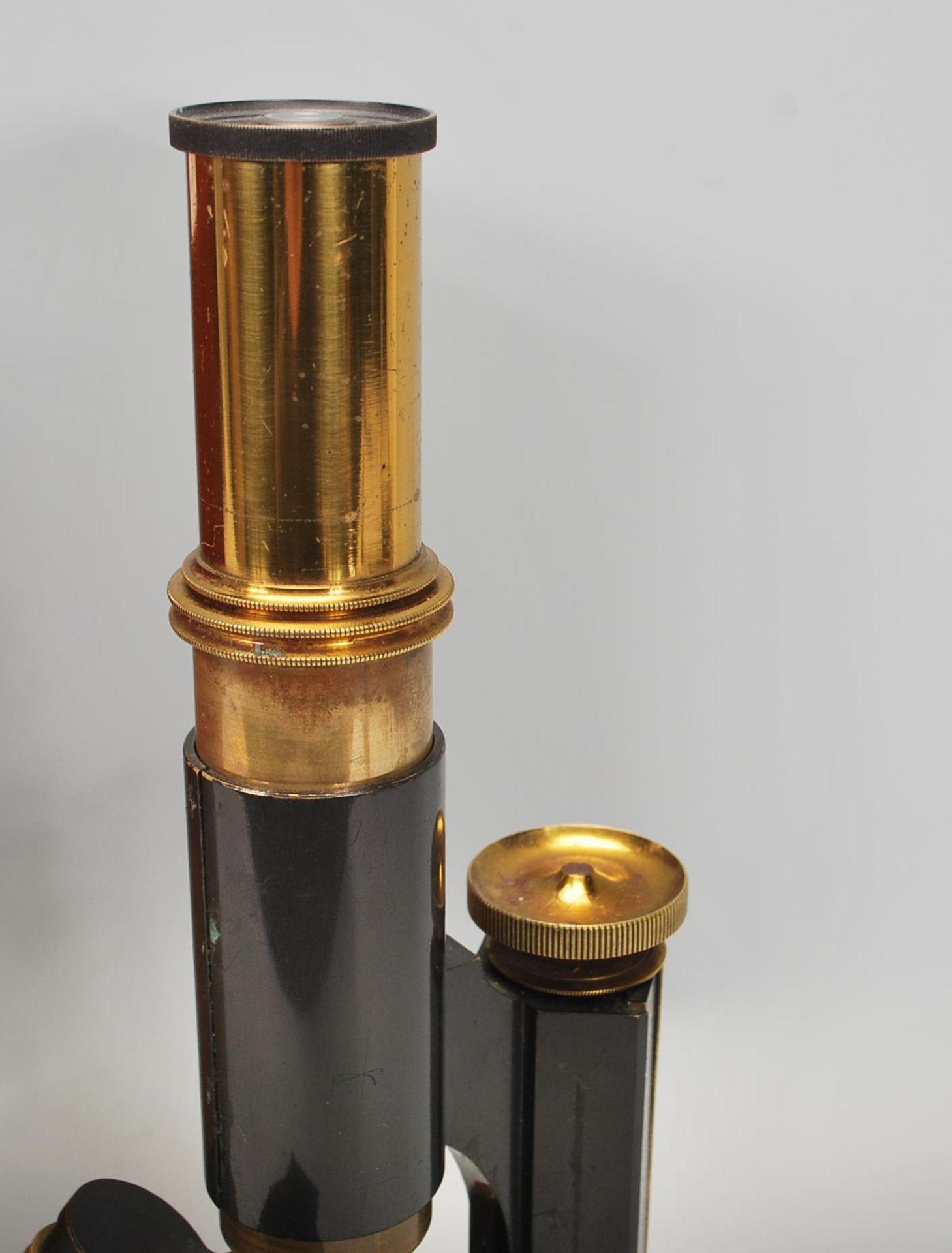 A late 19th early 20th Century J. Swift and Son, black japanned and lacquered brass microscope and - Image 4 of 8
