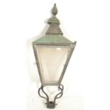 A 19th Century Victorian oxidised copper street lantern of tapering form body, finial top with glass