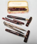 A collection of fountain pens to include a Burnham B48, Watermans, Platignum and cased Conway