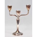 A 20th Century Bishton's silver hallmarked candelabra raised on a round base with a tapering