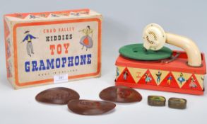 A vintage 20th Century Chad Valley Kiddies Toy Gramophone, in its original box with a selection of