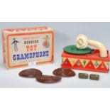 A vintage 20th Century Chad Valley Kiddies Toy Gramophone, in its original box with a selection of