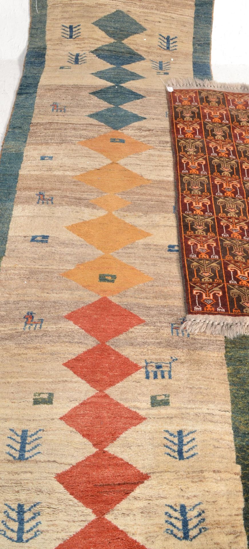 A collection of  20th century rugs to include a large red ground Persian runner with geometric - Image 2 of 7
