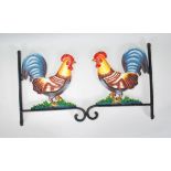 Two cast iron wall hangers / brackets having in the form of cockerels having coloured painted