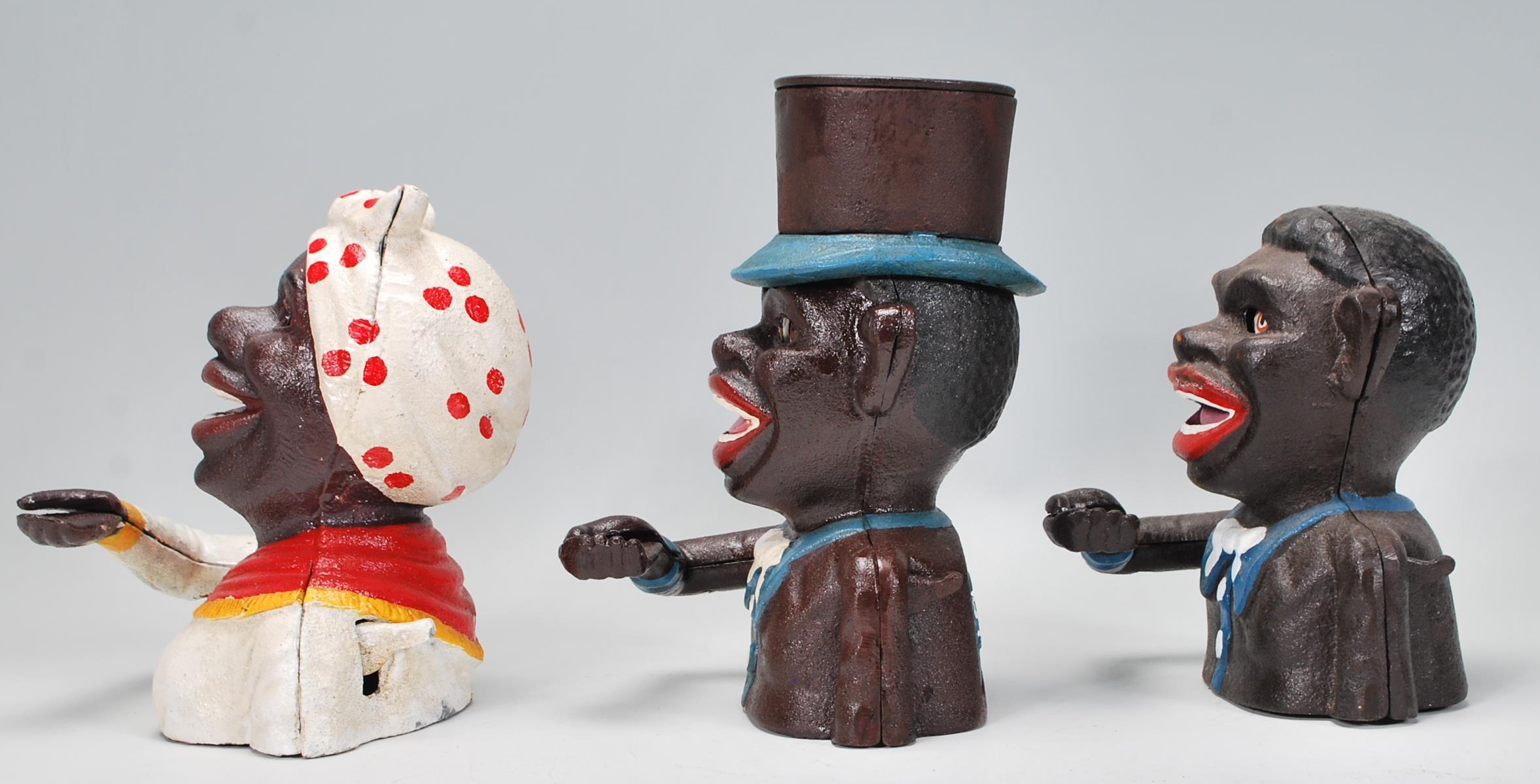 A group of three replica Little Joe style cast iron money banks to include two male figures and a - Image 4 of 6