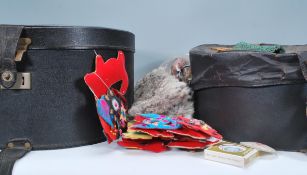 Two vintage 20th Century hat boxes containing a variety of items to include compacts, a ladies