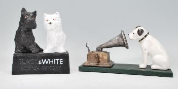 Two cast iron vintage style reproduction ornaments to include a HMV style dog and gramophone