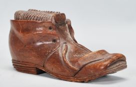 An early 20th century German Black Forest carved boot bearing the inscription ‘ Murren ‘ Circa 1910