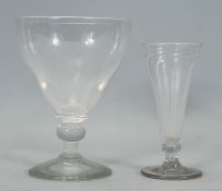 A large 19th Century Victorian glass rummer. The funnel shaped bowl raised on a knopped stem and