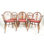 Lucian Ercolani - A set of six Ercol mid Century Old Colonial dining chairs of dark beech and elm