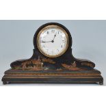 An early 20th century Japanned black lacquer and chinoiserie decorated dome top mantel clock in