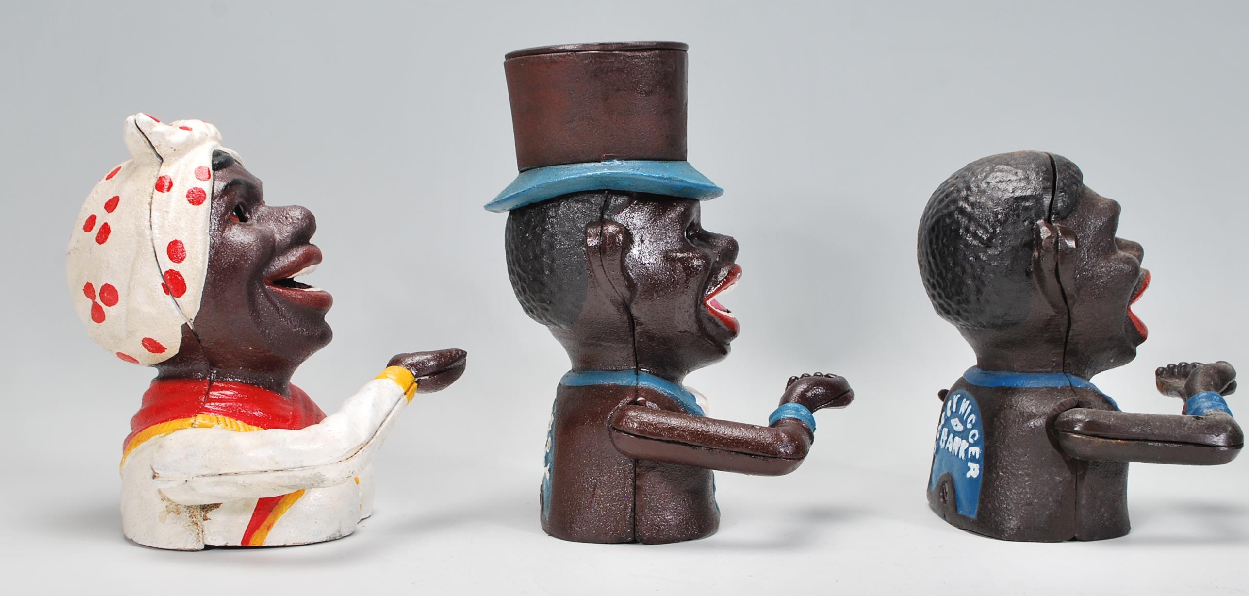 A group of three replica Little Joe style cast iron money banks to include two male figures and a - Image 2 of 6