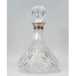 A 20th Century cut glass ships decanter of tapering form having a Mappin and Webb silver