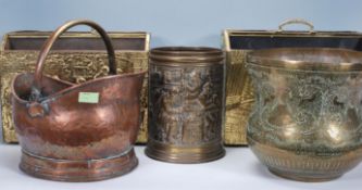 A collection of brass and copper wares to include 2 brass magazine racks, brass cauldron planter,