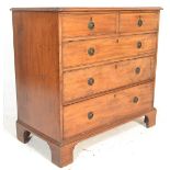An early 19th Century Georgian mahogany chest of drawers. The bank of two short drawers over three