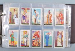 A album of vintage Godfrey Phillips cigarette cards, sets include; Famous Minors, Mechanized Age,