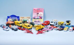 A collection of vintage diecast toy cars and vehicles to include Triang Minic Toys truck, Matchbox