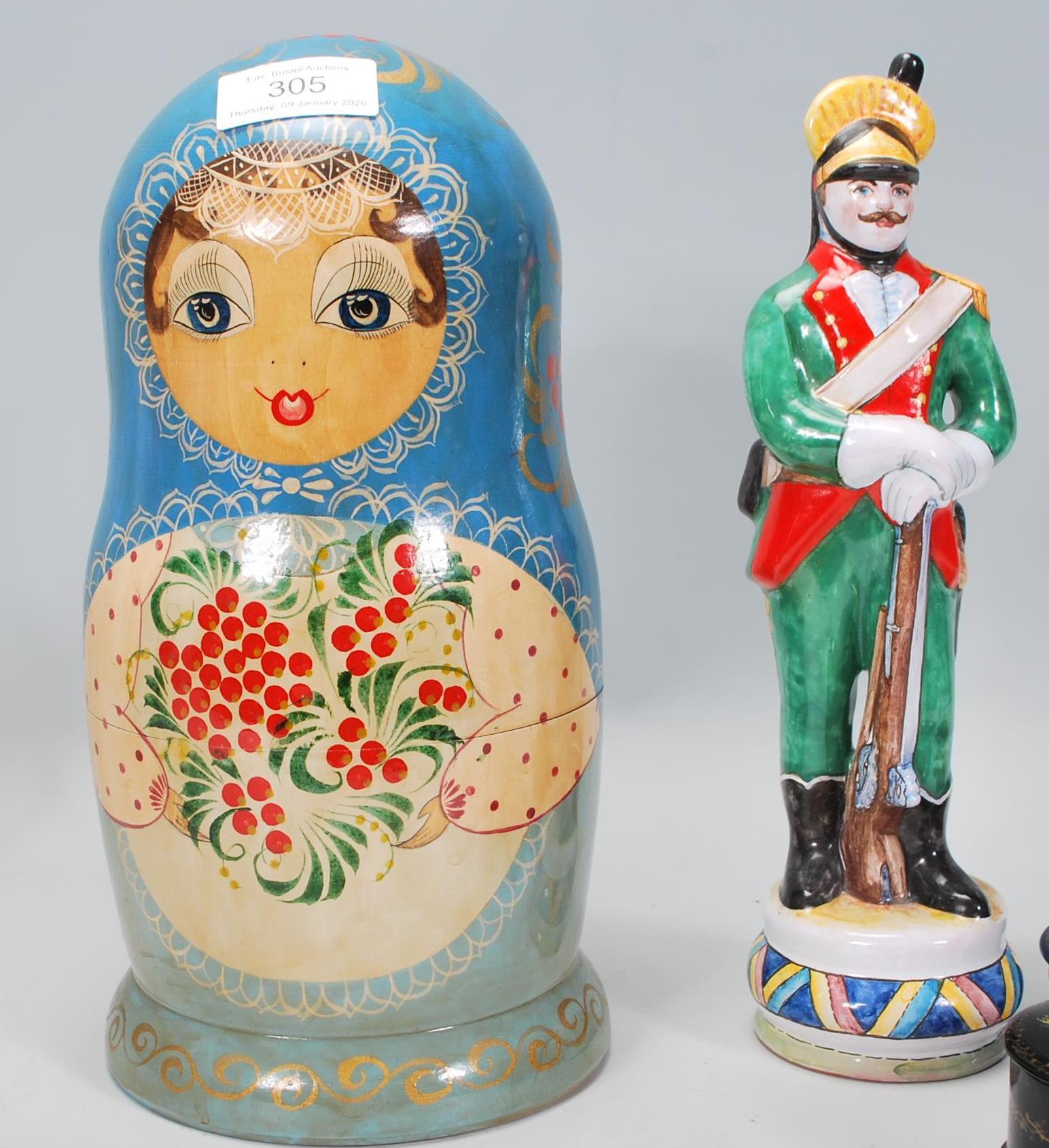 A collection of Russian ornaments to include a large set of russian dolls beung hand painted with - Image 3 of 9