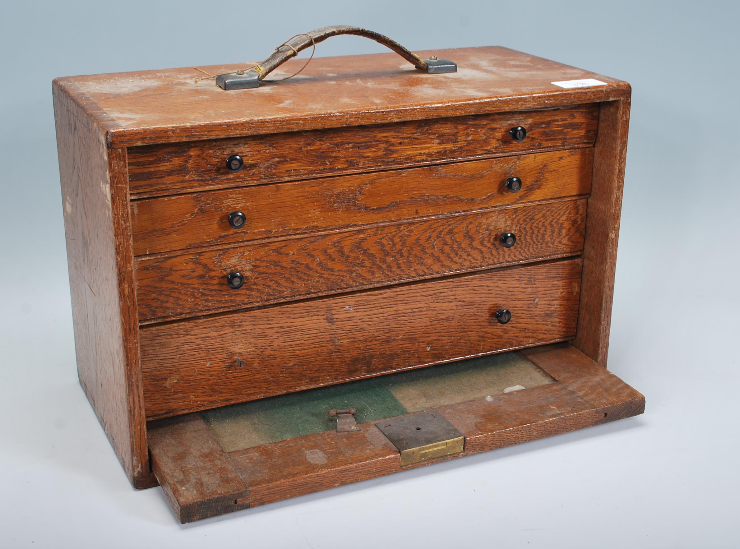 A vintage 20th Century oak engineers case, fall front revealing lined drawers containing engineers - Image 2 of 7