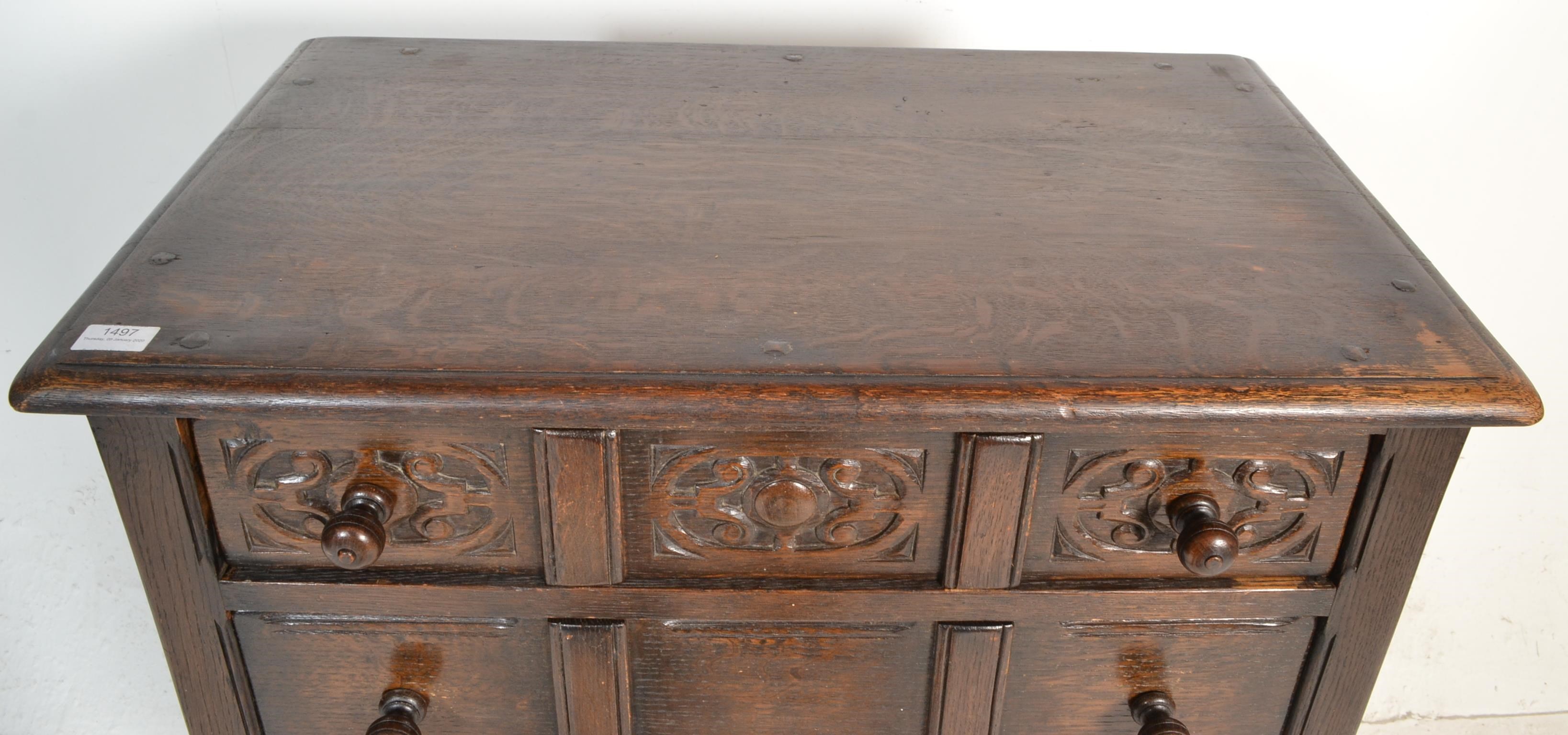 A Queen Anne revival oak chest of drawers on stand. Raised on cup and cover legs with peripheral - Image 3 of 5