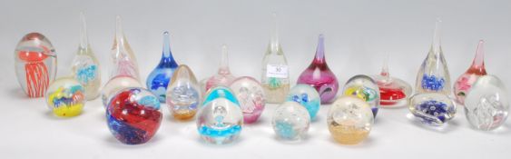 A large collection of approximate 27 20th Century paper weights to include tear shape with bubble