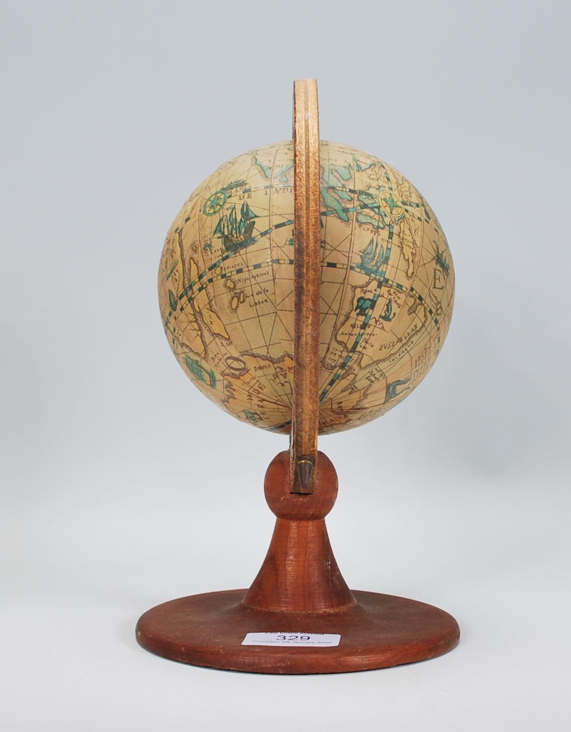 A antique style vintage desk top globe raised on a round wooden base with globe above set within a - Image 4 of 5