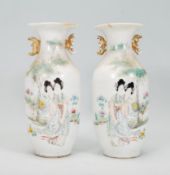 A pair of late 19th / early 20th Century Japanese vases of baluster form having flared rims with