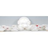 A vintage Royal Albert Val D'or pattern part tea service consisting of tea pot, tea cups, saucers,