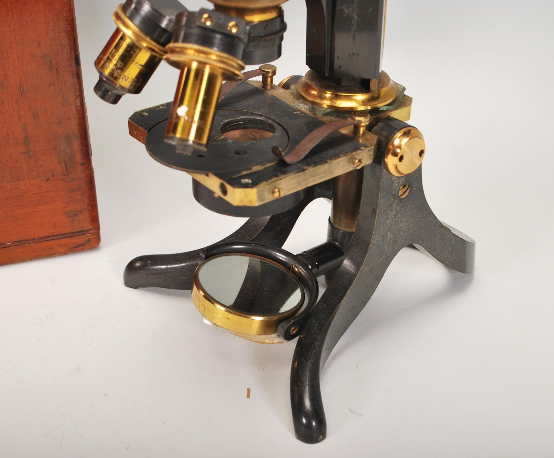 A late 19th early 20th Century J. Swift and Son, black japanned and lacquered brass microscope and - Image 2 of 8