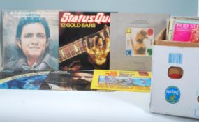 A collection vinyl long play LP record albums to included artists Status Quo, Johnny Cash, Robert