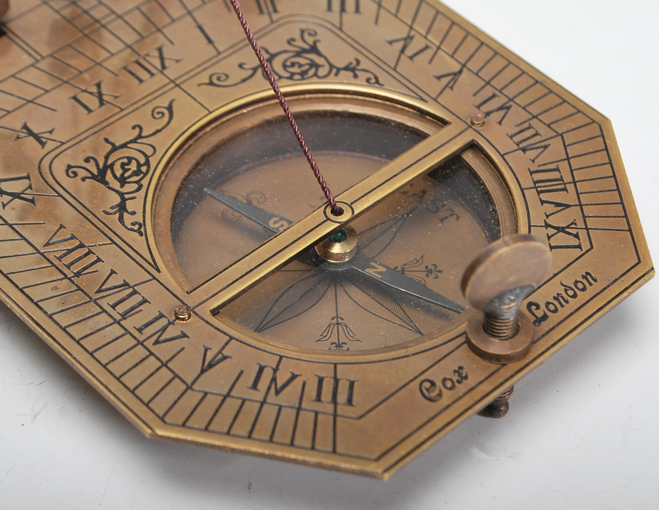 A 20th Century cased brass Sundial Compass, the compass set within the folding metamorphic - Image 3 of 9