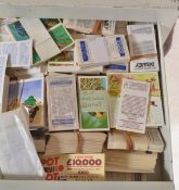 A Large collection of vintage and later cigarette and confectionery trade cards stored within a
