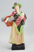 An early 20th Century Royal Doulton character figure 'Sweet Lavender' HN1373: Designed by L