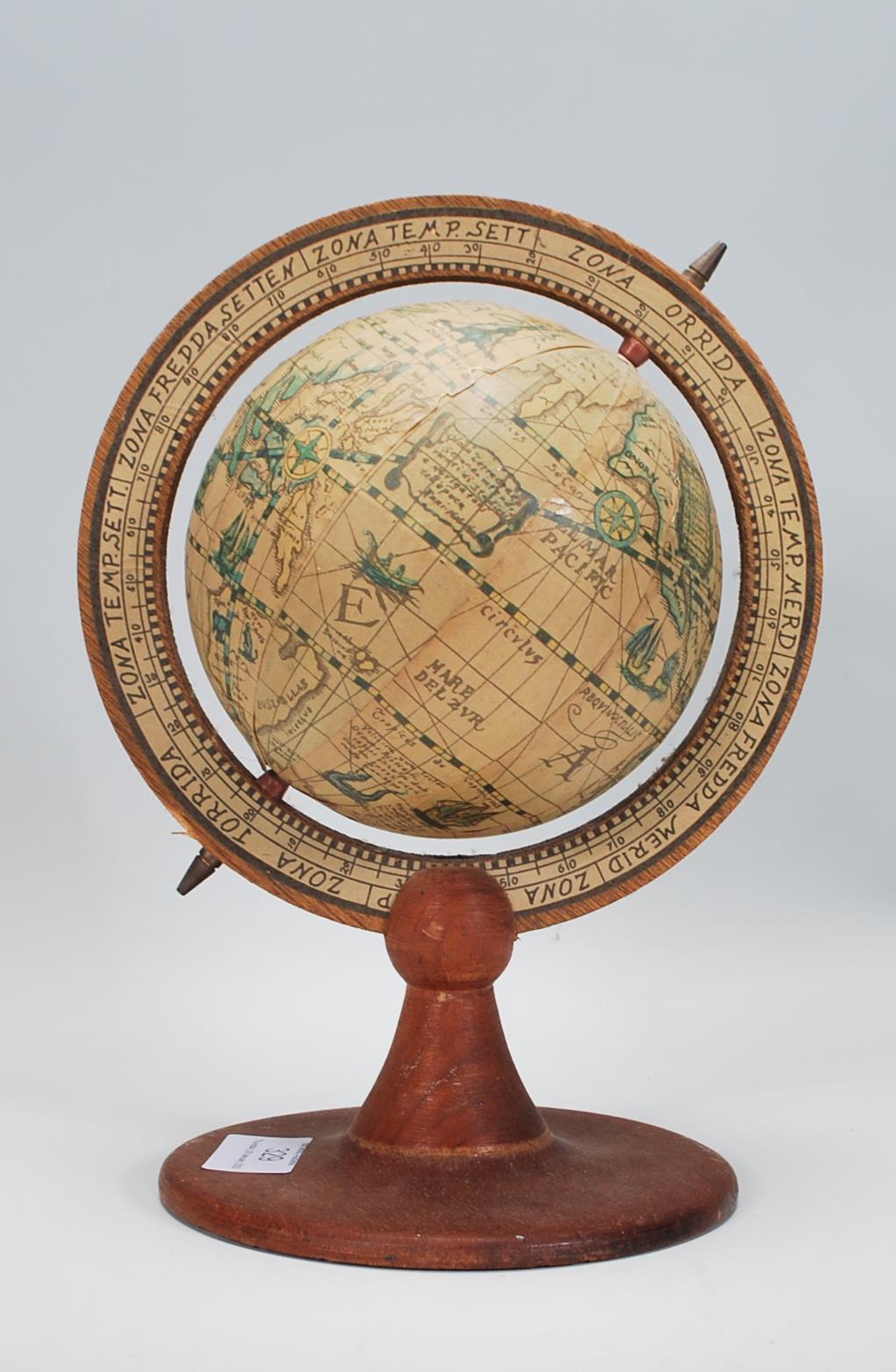 A antique style vintage desk top globe raised on a round wooden base with globe above set within a - Image 3 of 5
