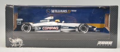 A Mattel made Hot Wheels Racing series 1/18 scale boxed diecast model 26735 F1 Formula One