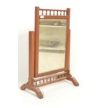 An early 20th Century country pine swing / bathroom mirror, central bevelled mirror glass panel