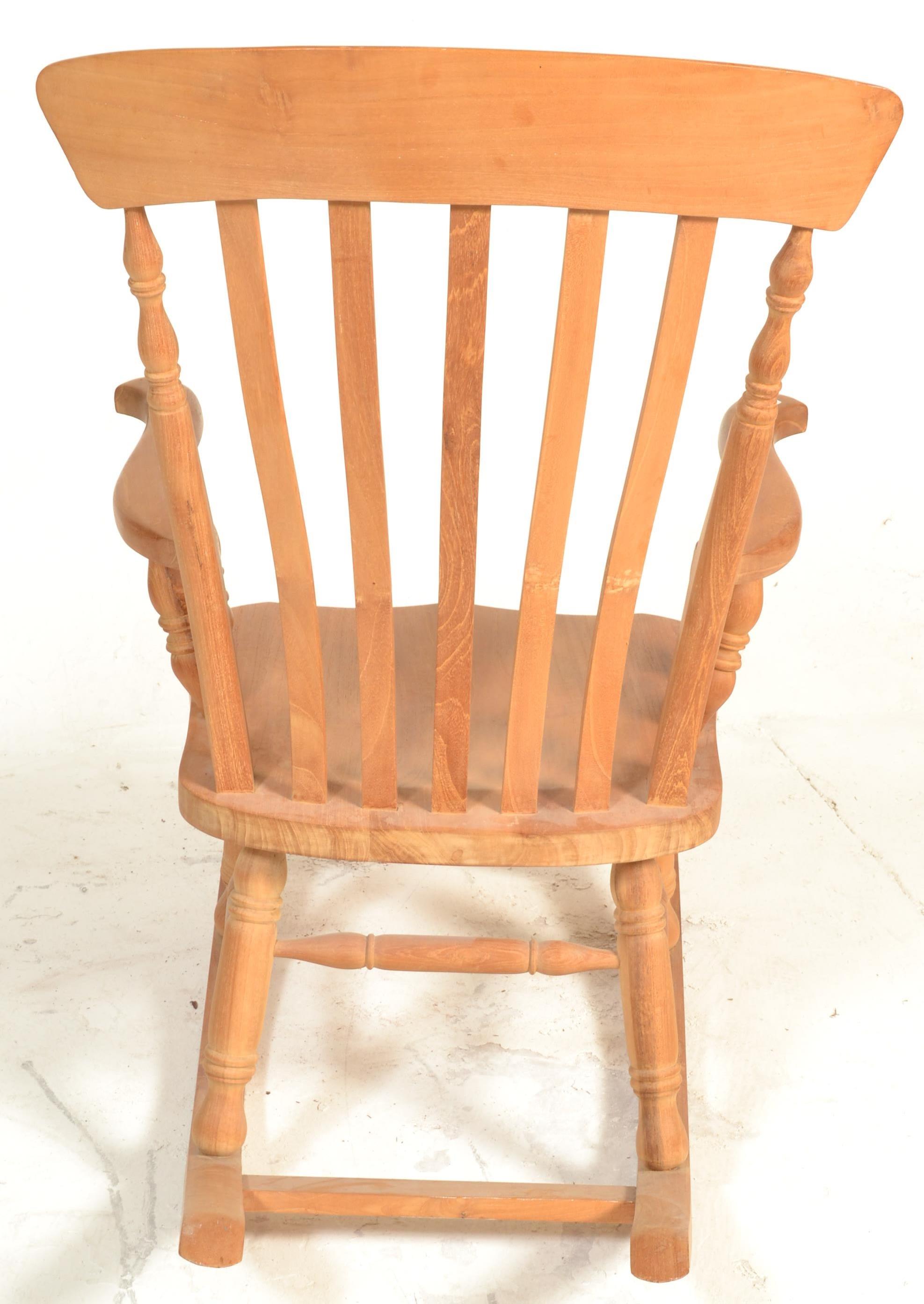 A good quality Windsor rocking chair / armchair. Of beech wood construction having turned legs on - Image 5 of 5
