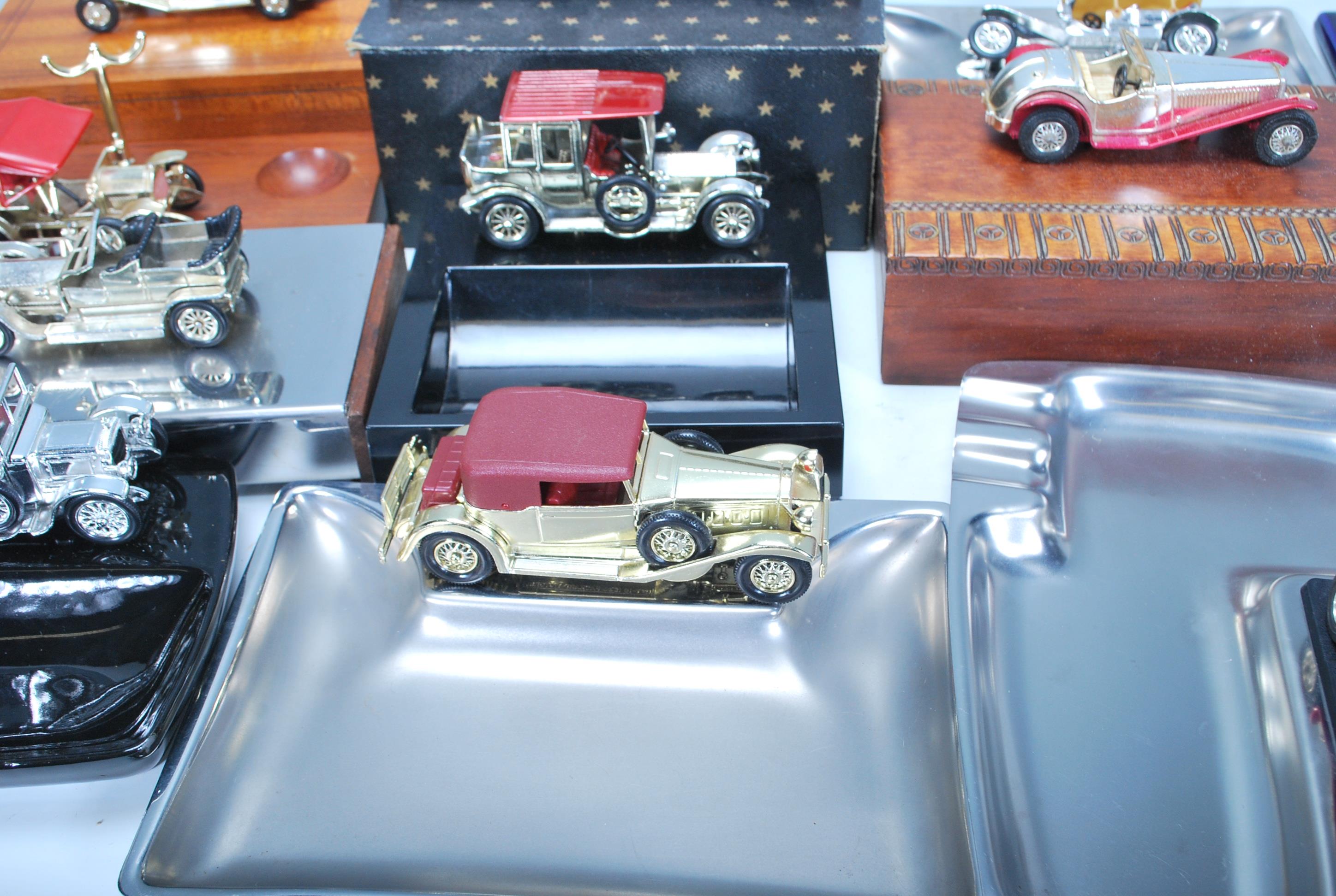 A large collection of Matchbox Vintage toy car topped ashtrays, trinket boxes, pen holders, pipe - Image 6 of 10