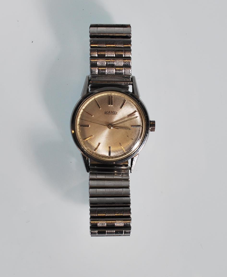A vintage 1960's Roamer waterproof wrist watch having a silvered dial with baton numerals to the